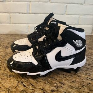 Nike Kids Black and White High-Top cleats
